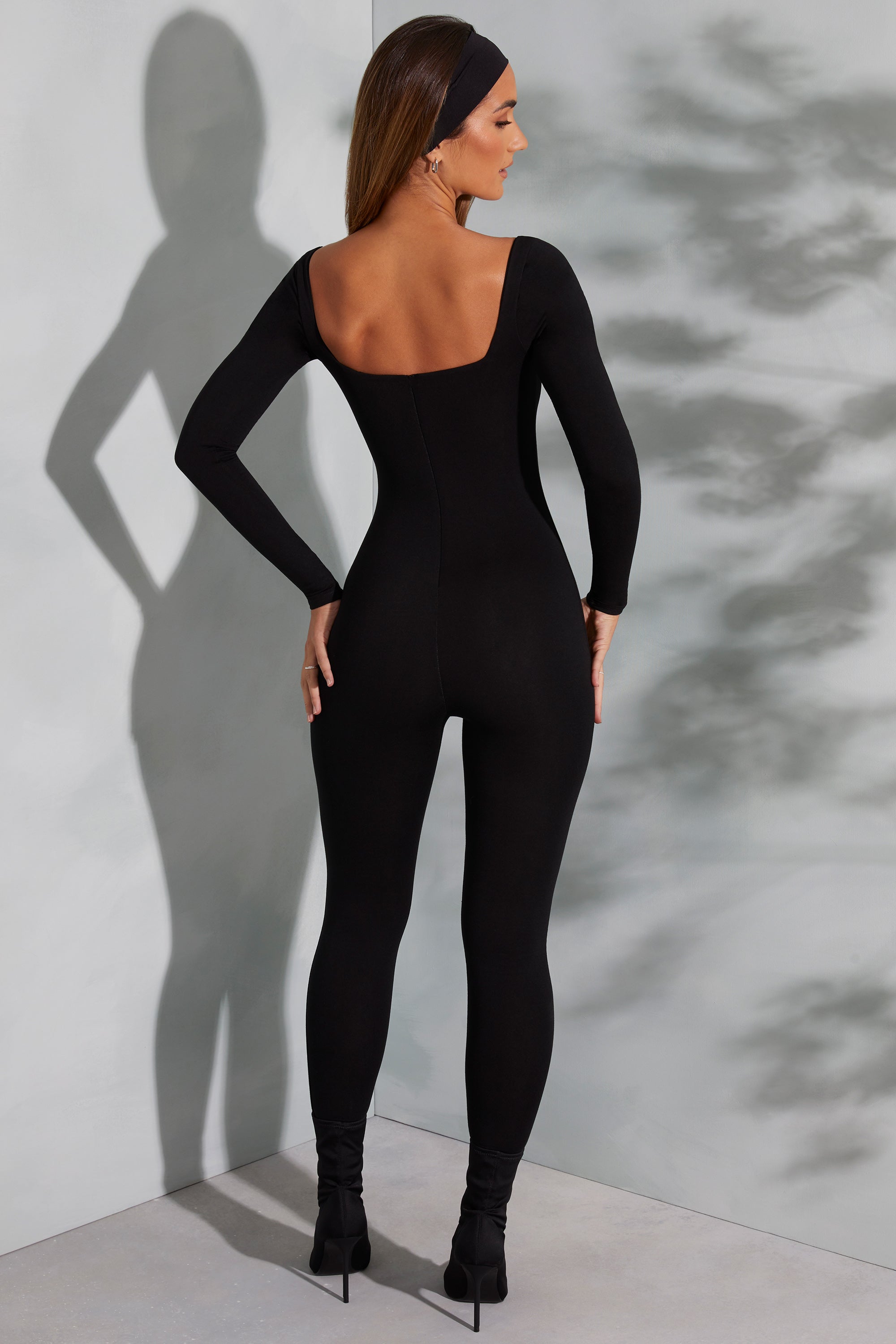 Tight black best sale jumpsuit long sleeve