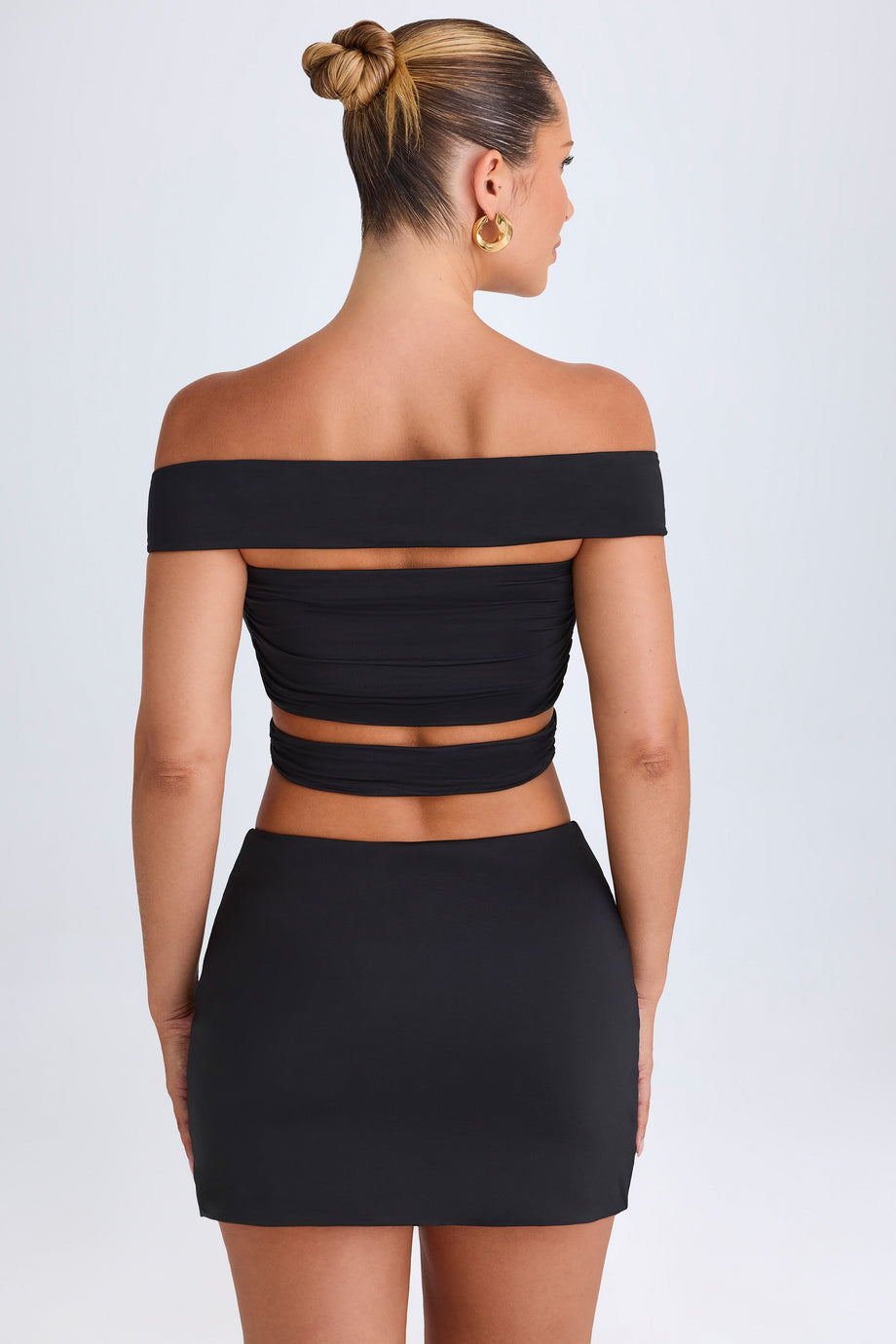 Cut-Out Off-Shoulder Crop Top in Black