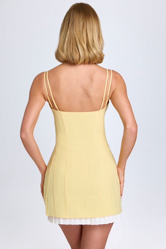 Bow-Detail Pleated Mini Dress in Pastel Yellow