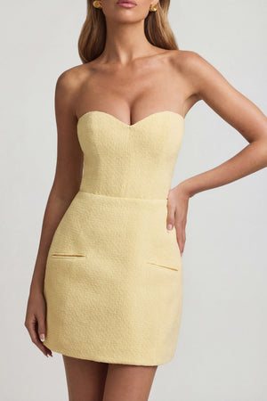 Oh Polly's Freya Tidy wearing the Talina Mini Dress in Pastel Yellow Tweed fabric perfect for summer brunch dates