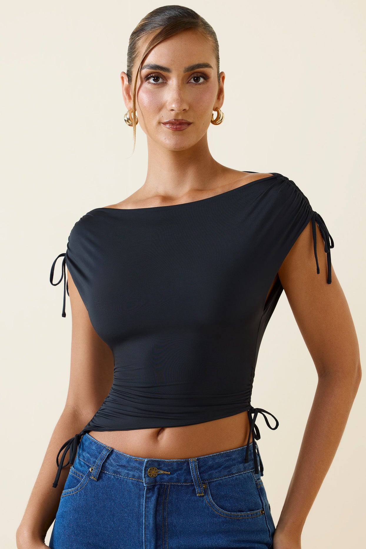 Asymmetric Ruched Cowl-Back Crop Top in Black