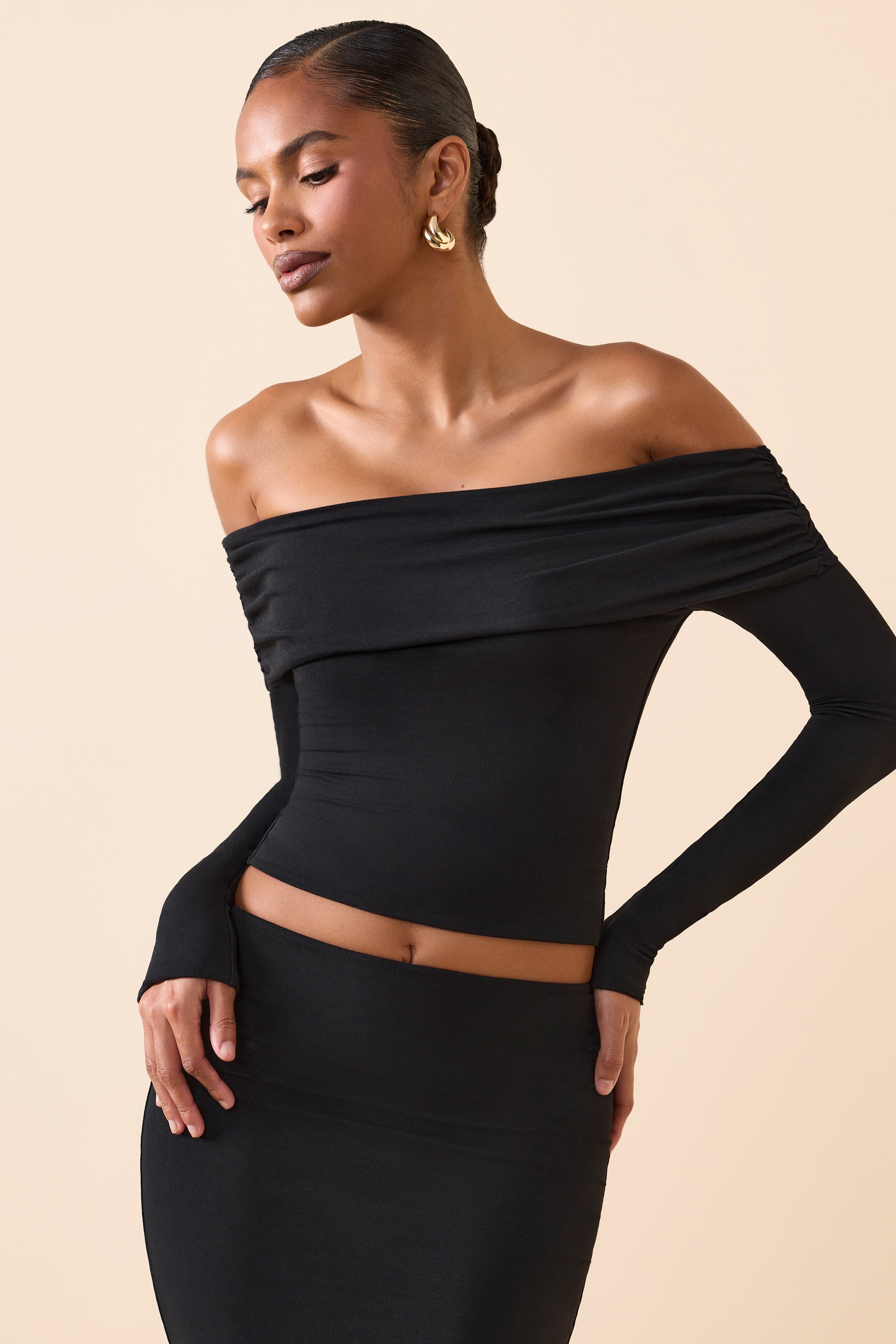 black v neck off the shoulder top