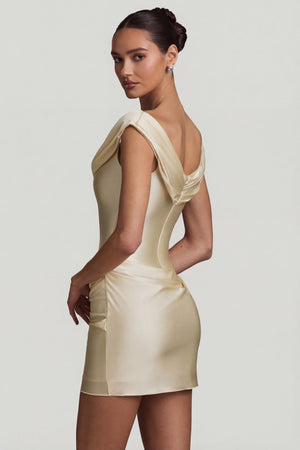 Oh Polly's Anna wearing the Maeve Mini Dress in Ivory Satin Jersey fabric perfect for summer garden parties