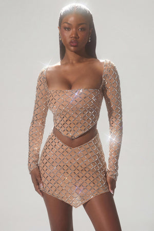 Oh Polly's Sevah wearing the Thora Crop Top in Almond Square Hotfix fabric perfect for girls' night out