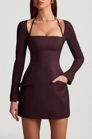 Oh Polly's Anna wearing the Ksenia Mini Dress in Chocolate Brown Stretch Woven fabric perfect for cocktail parties