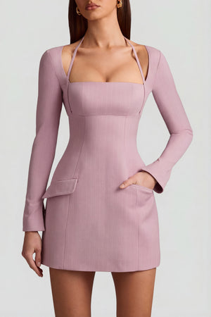 Oh Polly's Anna wearing the Ksenia Mini Dress in Mauve Stretch Woven fabric perfect for a girls' night out
