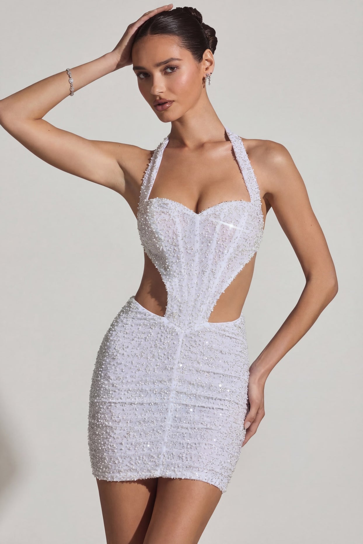 Embellished Cut-Out Halterneck Mini Dress in White - 1