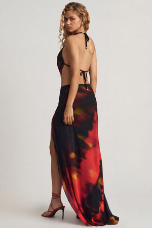 Oh Polly's Juliana Nulu wearing the Keona Maxi Skirt in Red Blurred Print Chiffon fabric perfect for romantic date nights