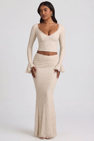 Oh Polly's Yarelis wearing the Vanda Maxi Skirt in Ivory Stretch Lace fabric perfect for summer garden parties