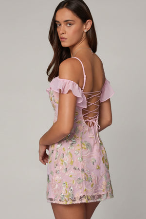 Oh Polly model Roberta wearing the Jacira Mini Dress in Ballet Pink Sequin, Chiffon fabric perfect for evening dinners