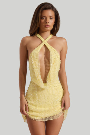 Oh Polly model Sophia wearing the Sylune Mini Dress in Yellow Pearl Embellished fabric perfect for birthday celebrations