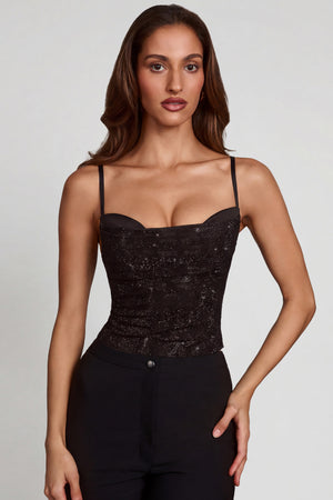 Oh Polly's Yasmin wearing the Armelia Full Top in Black Hotfix Square Hotfix fabric, perfect for a night out