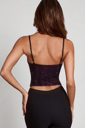 Oh Polly's Yasmin wearing the Armelia Full Top in Purple Snake Square Hotfix fabric perfect for a night out