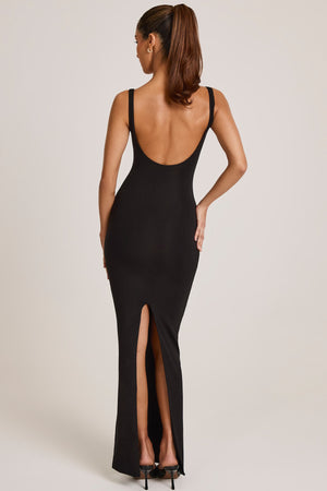 Oh Polly model Yasmin wearing the Soreia Maxi Dress in Black Modal fabric perfect for cocktail parties