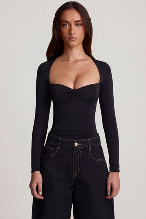 Oh Polly's Roberta wearing the Vayla Full Top in Black Sheer Jersey fabric perfect for a night out