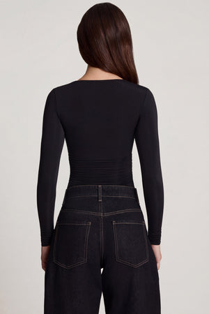 Oh Polly's Roberta wearing the Vayla Full Top in Black Sheer Jersey fabric perfect for a night out