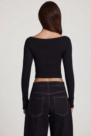 Oh Polly's Roberta wearing the Charliane Full Top in Black Modal fabric perfect for a night out