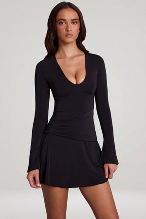 Oh Polly's Roberta wearing the Carielle Mini Dress in Black Sheer Jersey fabric perfect for date night style