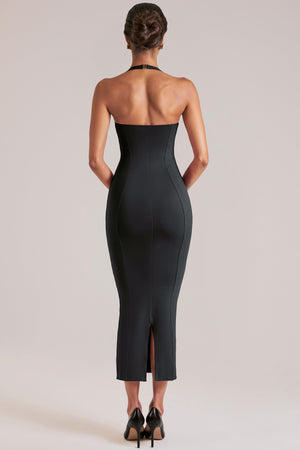 Oh Polly model Yasmin wearing the Landen Midi Dress in Black Modal fabric perfect for cocktail parties