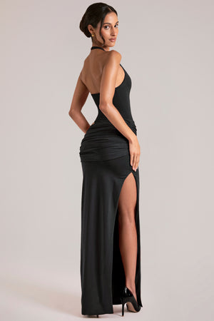 Oh Polly model Yasmin wearing the Oona Maxi Dress in Black Modal fabric perfect for holiday celebrations