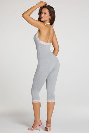 Oh Polly model Georgia wearing the Calla Jumpsuit in Grey Marl Modal fabric perfect for running daily errands