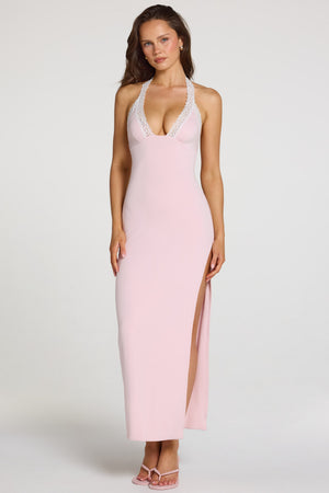 Oh Polly model Georgia wearing the Dahlia Maxi Dress in Baby Pink Modal fabric perfect for beach vacations