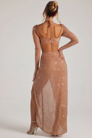 Oh Polly's Priscilla wearing the Champel Maxi Dress in Nude Embellished fabric perfect for summer weddings
