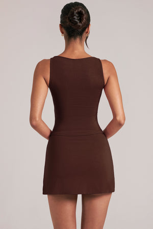 Oh Polly model Yasmin wearing the Tula Mini Skirt in Chocolate Brown Modal fabric perfect for brunch with friends