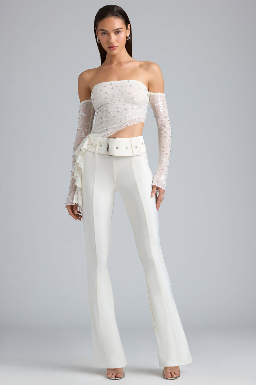 Metallic Belted Mid-Rise Flared Trousers in Ivory - 1