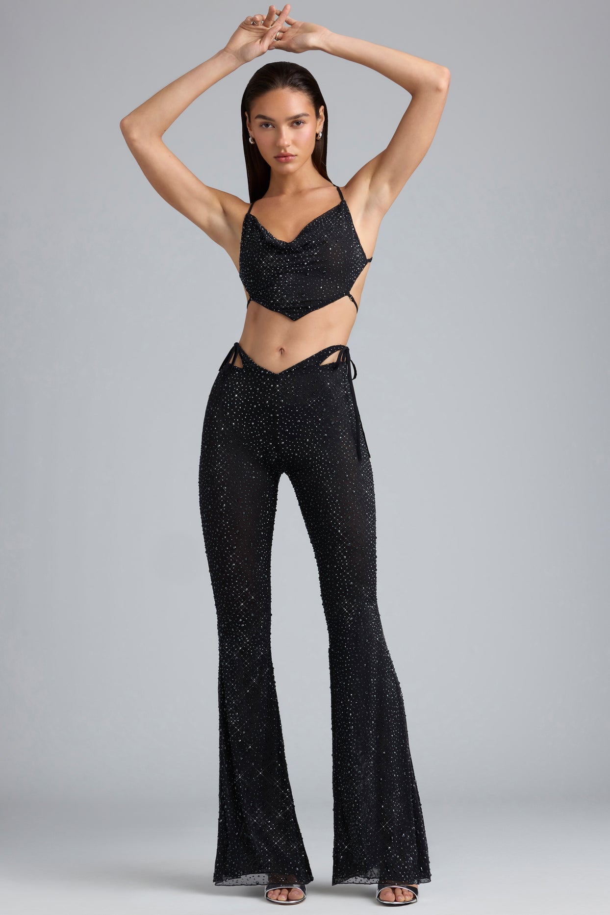 Ruby Embellished Cut-Out Flared Trousers in Black | Oh Polly