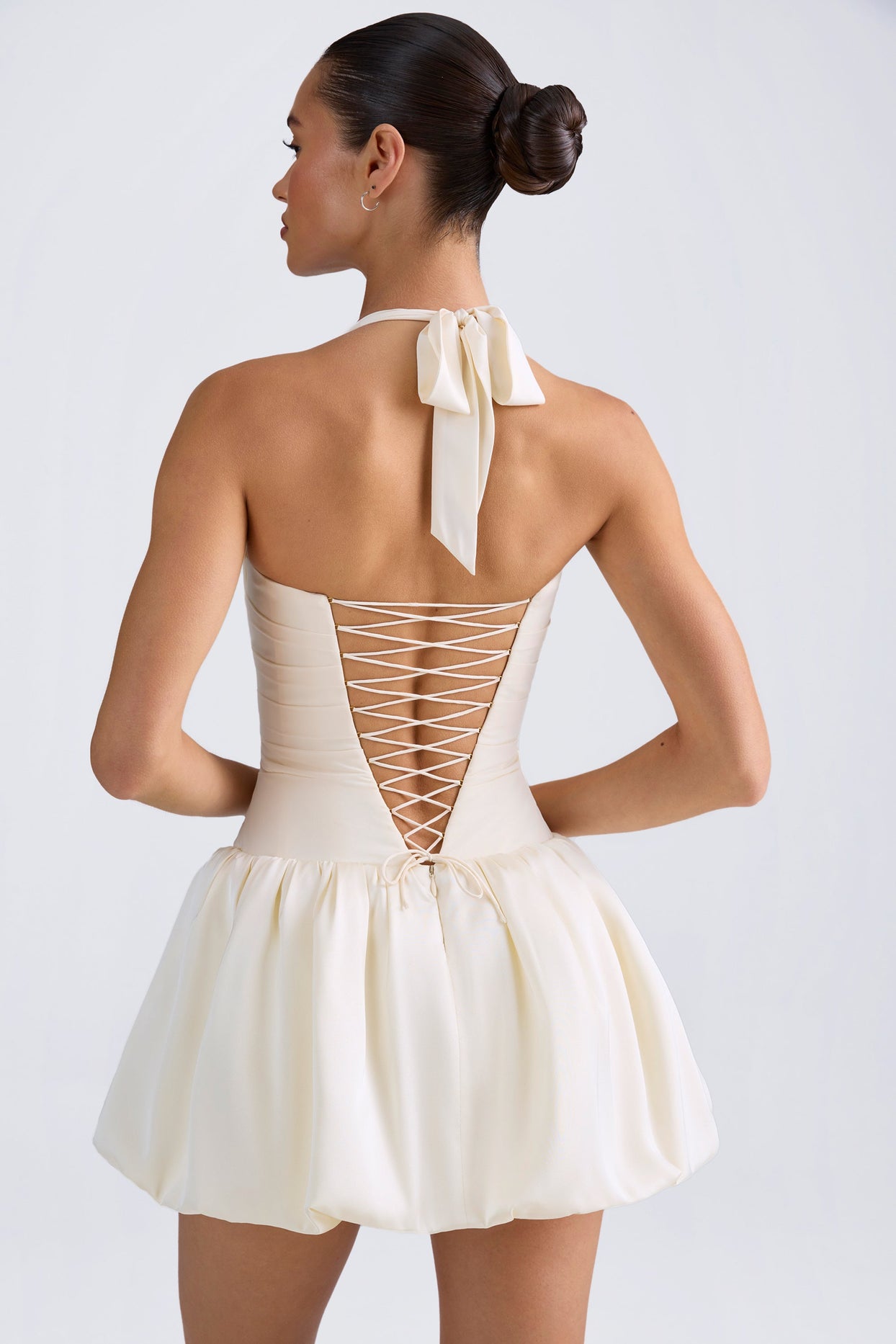 Ludmila Halterneck Lace-Up Bubble Hem Corset Micro Mini Dress in Ivory