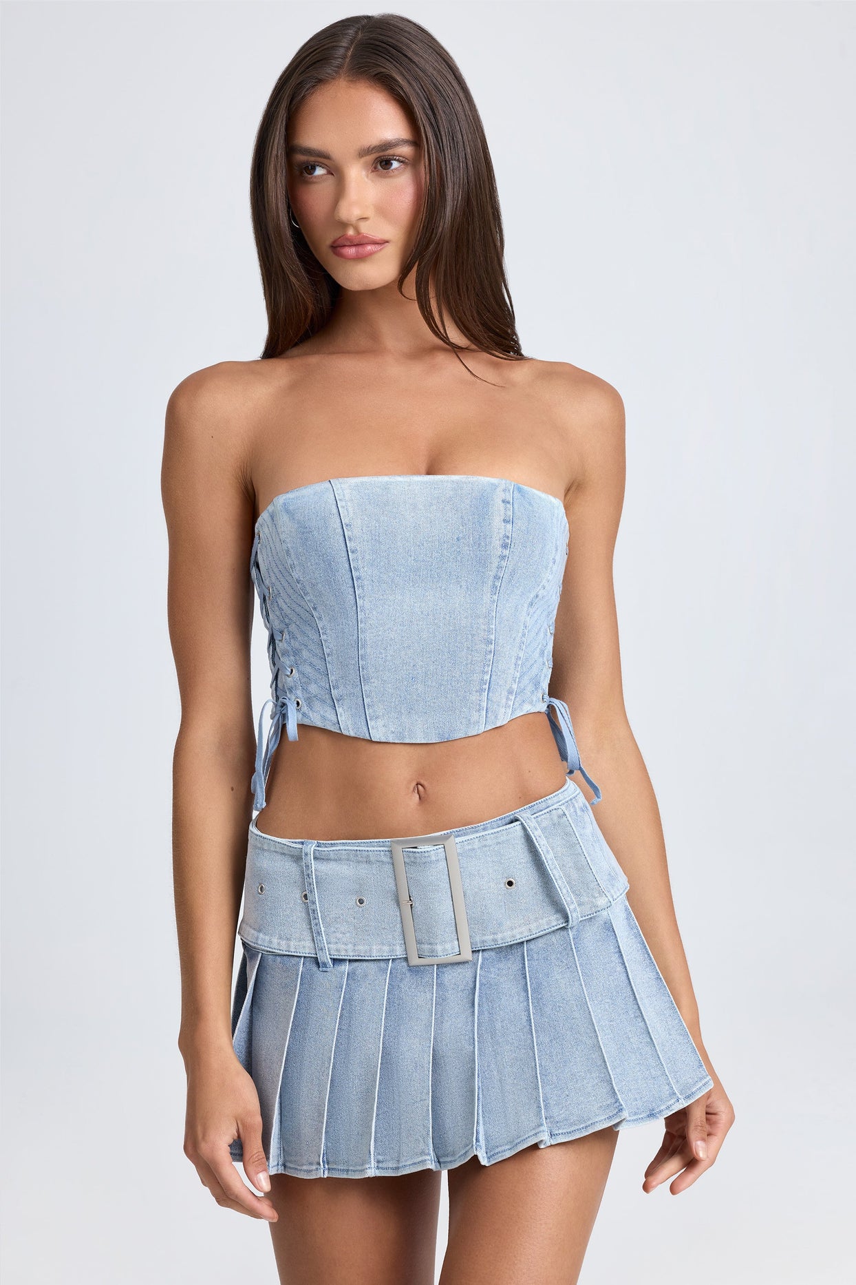 Belted Pleated Low-Rise Micro Mini Skirt in Light Blue Stonewash