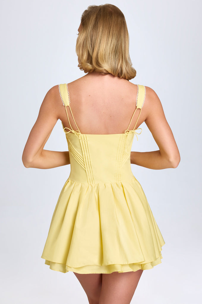 Pintucked Lace-Up Corset Mini Dress in Pastel Yellow