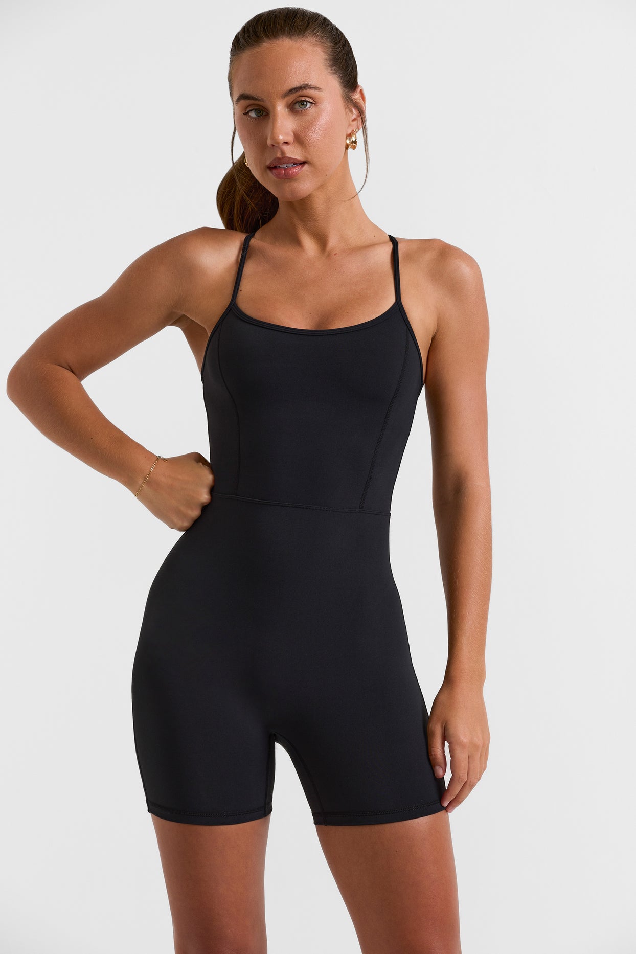 Scoop Neckline Open Back Unitard in Black