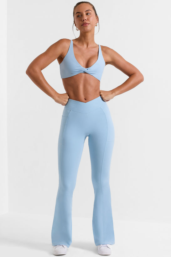 Cross Waistband Flare Pocket Leggings in Ice Blue