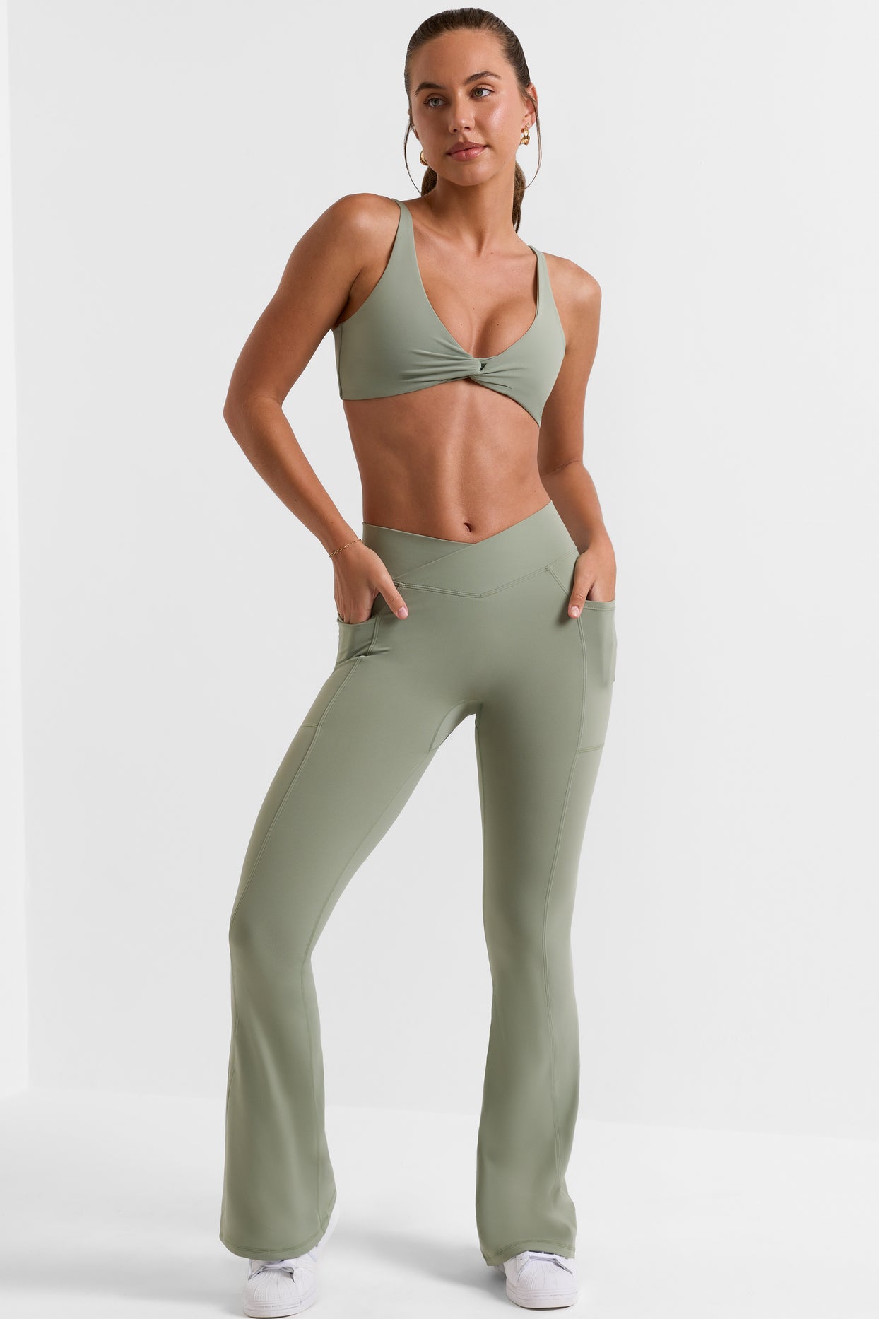 Petite Cross Waistband Flare Pocket Leggings in Bamboo Green