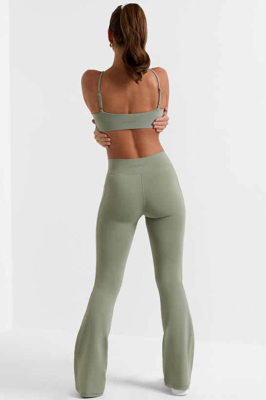 Petite Cross Waistband Flare Pocket Leggings in Bamboo Green