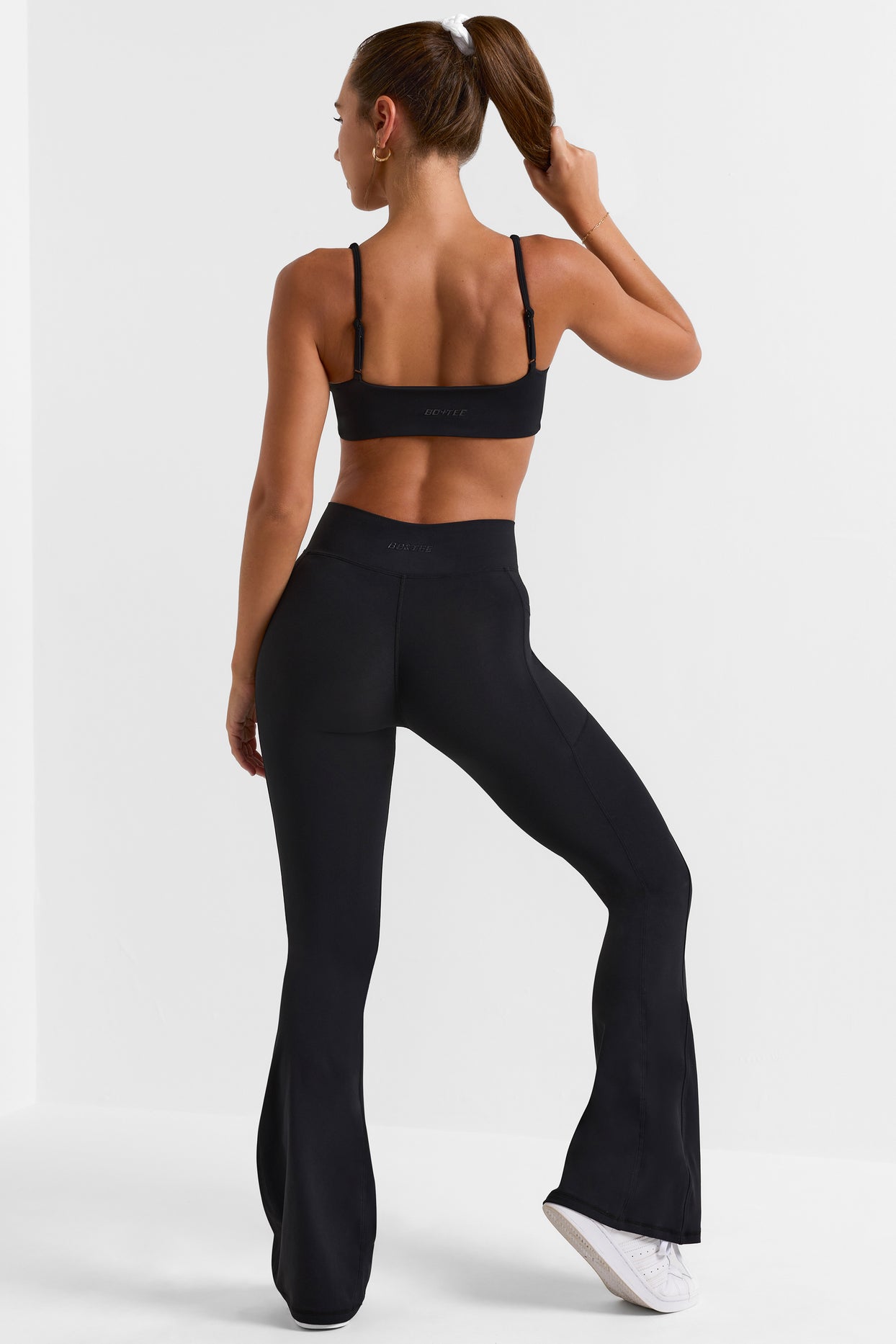 Petite Cross Waistband Flare Pocket Leggings in Black