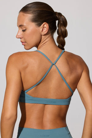Multiway Twist Front Sports Bra in Stone Blue