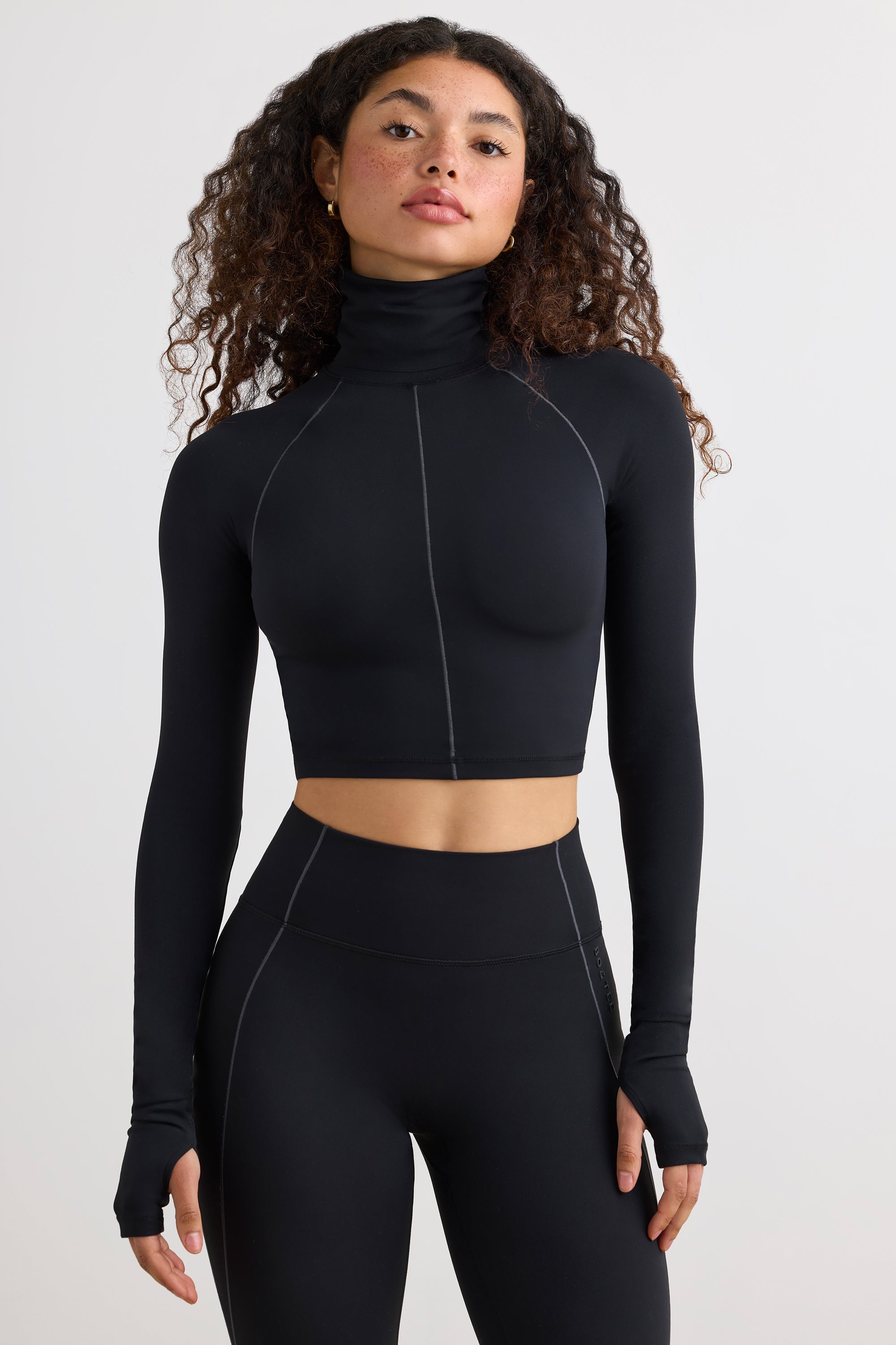 Soft Active Turtleneck Crop Top in Black