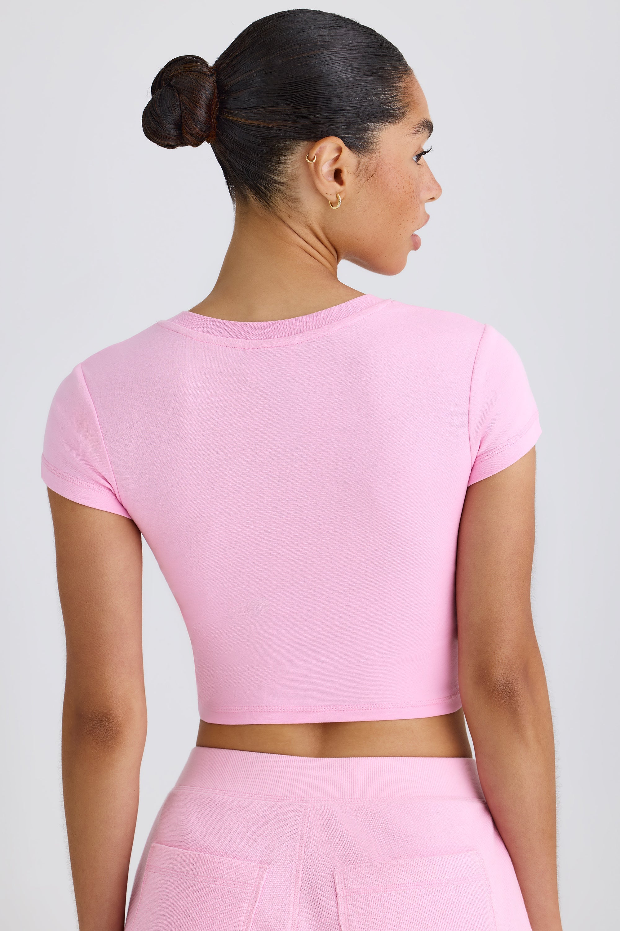 pink graphic crop top