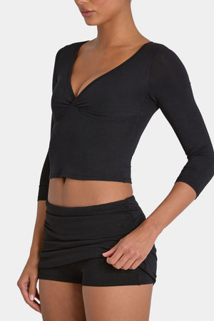 Bo+Tee model Kiele wearing the BT16355__Black Skirt in Black Modal fabric perfect for summer parties
