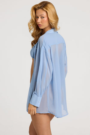 Oh Polly Swim's Bella wearing the Hiva Full Top in Sky Blue fabric perfect for resort stays