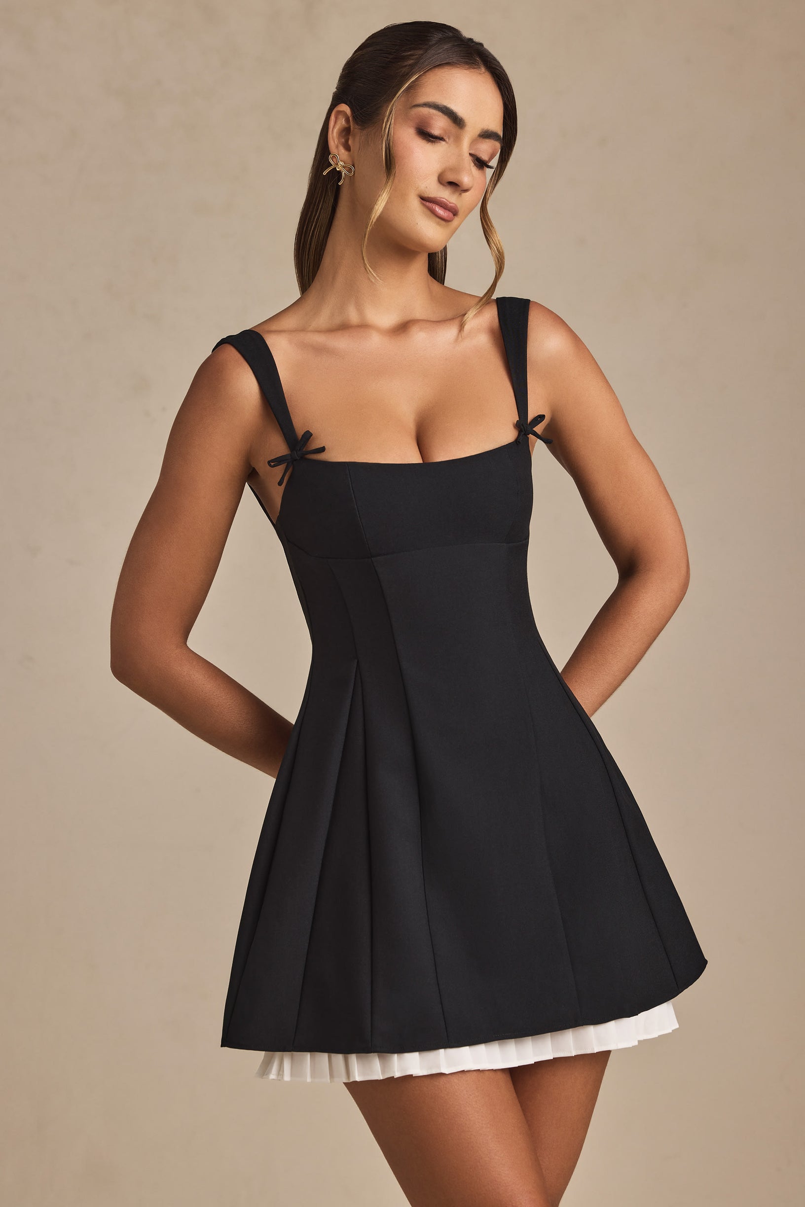 Bow-Detail Pleated A-Line Mini Dress in Black - 1