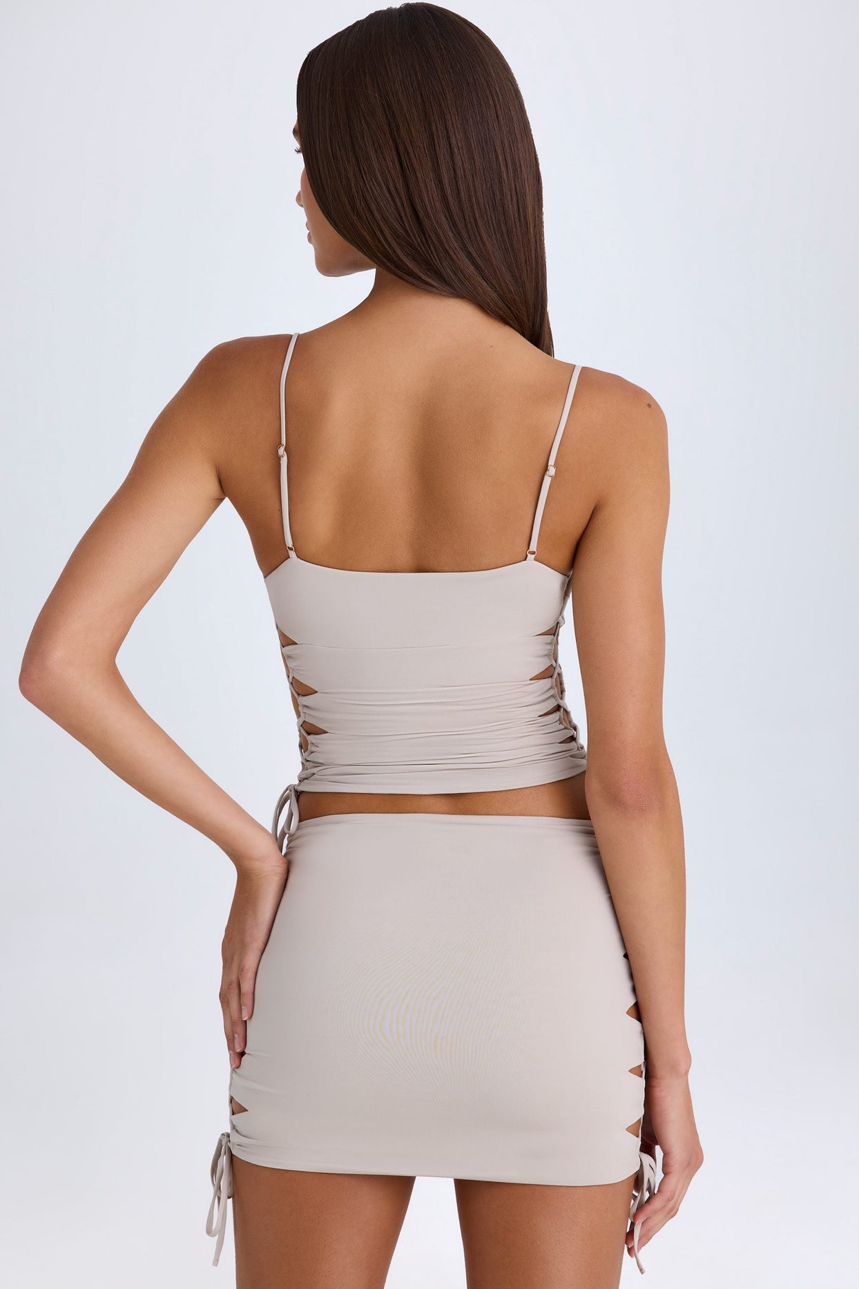 Ruched Cut-Out Mini Skirt in Taupe