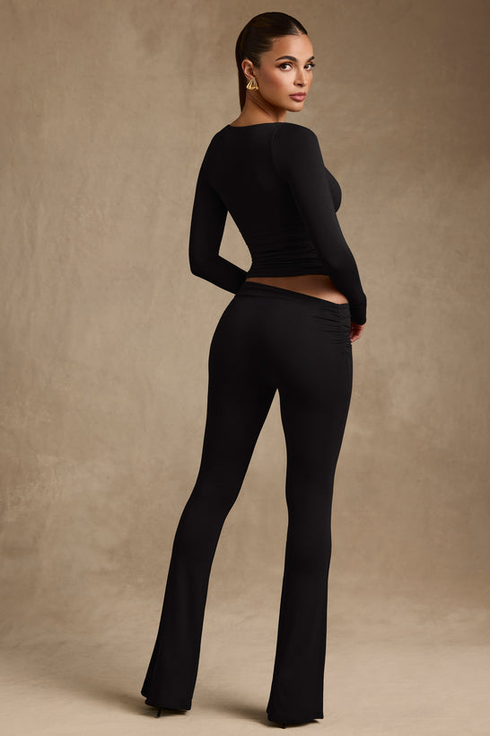 Modal Asymmetric-Waist Flared Trousers in Black