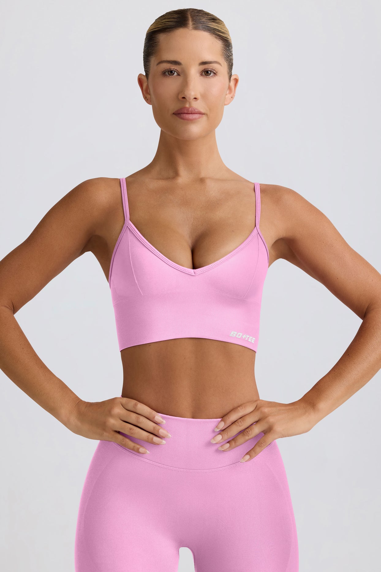 Define Luxe V-Neck Sports Bra in Bubblegum Pink - 1