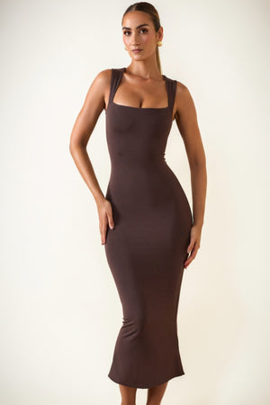 Oh Polly's Priscilla wearing the Ainslee Midaxi Dress in Chocolate Brown Modal fabric perfect for a romantic dinner date