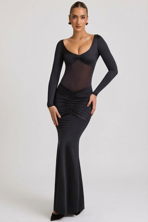 Oh Polly's Priscilla wearing the Alila Maxi Dress in Black Satin Jersey fabric perfect for holiday celebrations