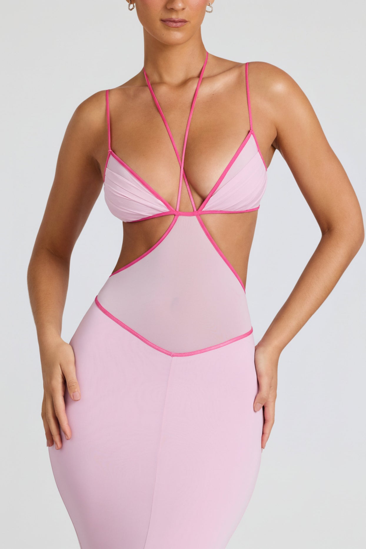 Oh Polly's Tori wearing the Bella Gown Length Dress in Soft Pink Sheer Jersey fabric perfect for luxury dinner dates